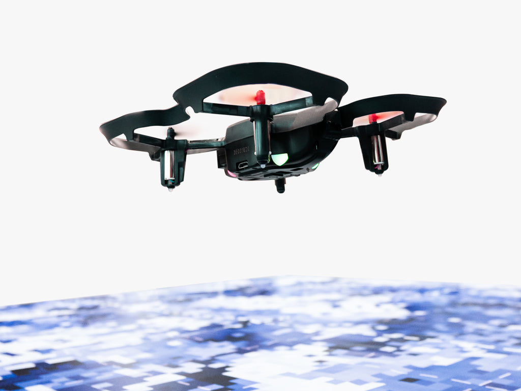 CoDrone Programming Mat with the CoDrone EDU flying above it