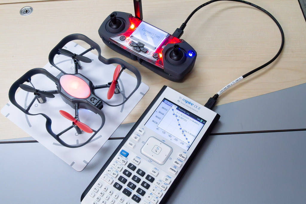 CoDrone EDU with Cable for TI Nspire CX II plugged into the calculator and controller.
