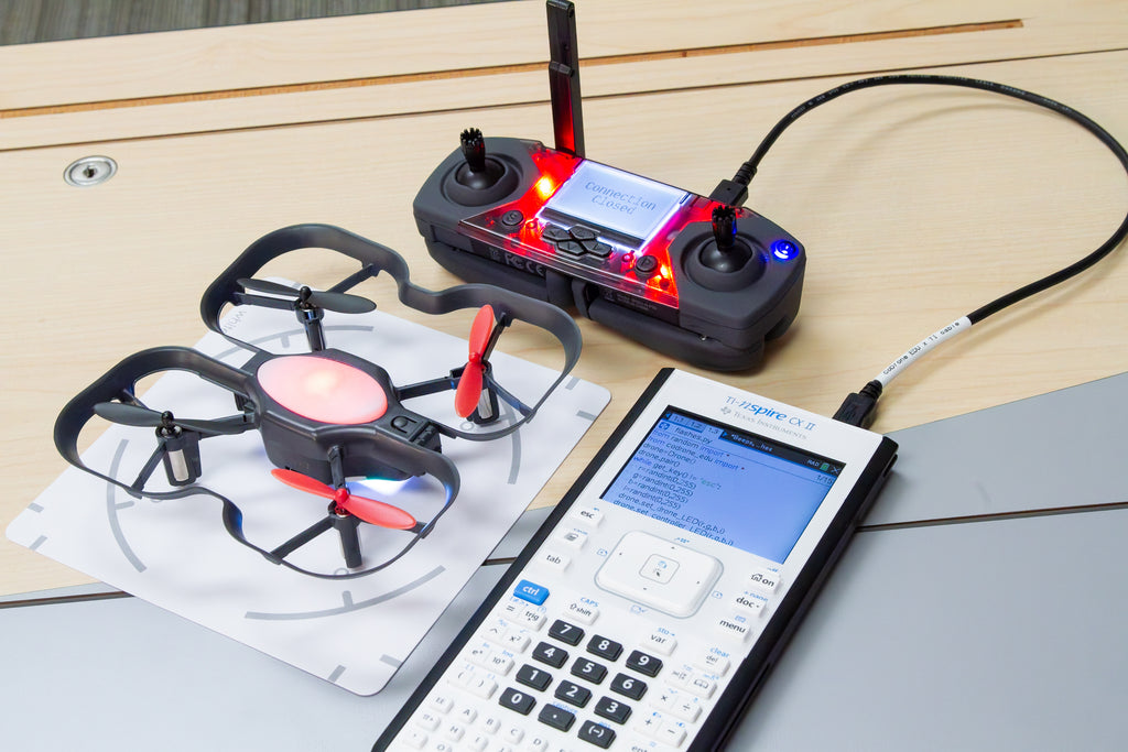 CoDrone EDU with Cable for TI Nspire CX II plugged into the calculator and controller.